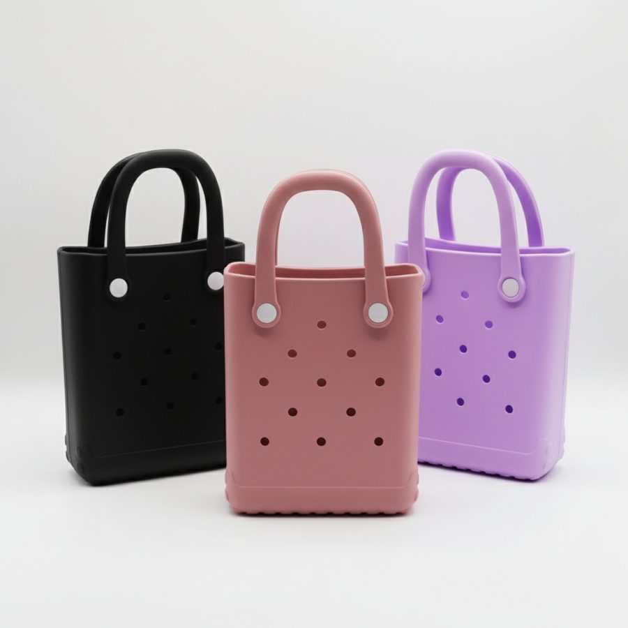Three Mini Bogg Bags in Black, Pink, and Purple