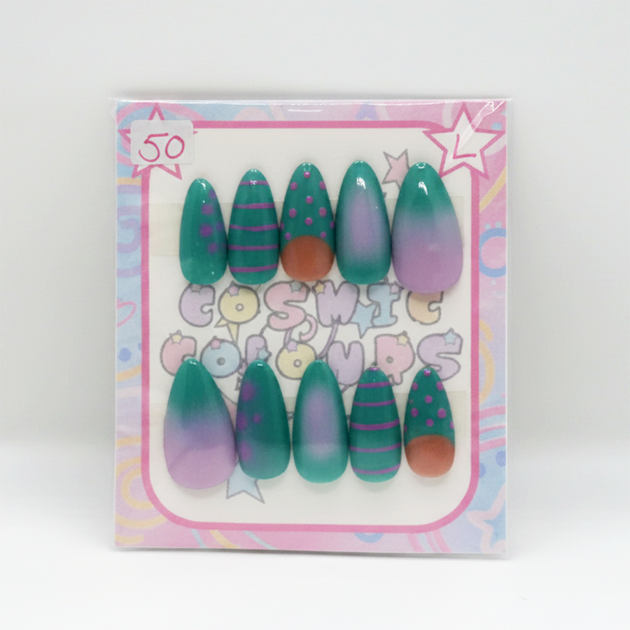 Handcrafted Dot and Dash blue press-on nails featuring modern blue nail art in a long almond shape.